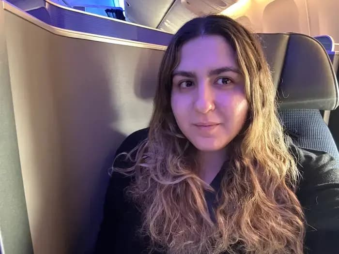 Leslie R., Business Class Traveler — OneSkies customer testimonial portrait